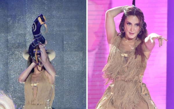 Claudia Leitte canta na chuva e toca berrante durante show de São João