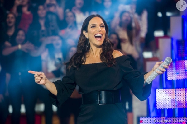 Fã invade palco e Ivete Sangalo, vestida de Mulher-gato, surpreende: 'Solta ele'