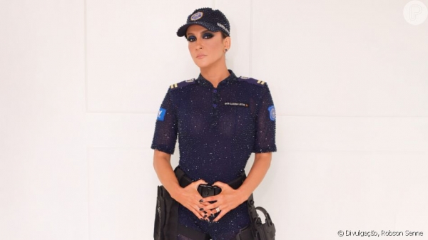 Claudia Leitte valoriza policiais com look empoderado no Carnaval baiano.